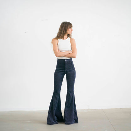 SIMIS The Holly Cord Flares in Navy – stylish navy-blue corduroy flare pants with a tailored high waist and bold, confident look.