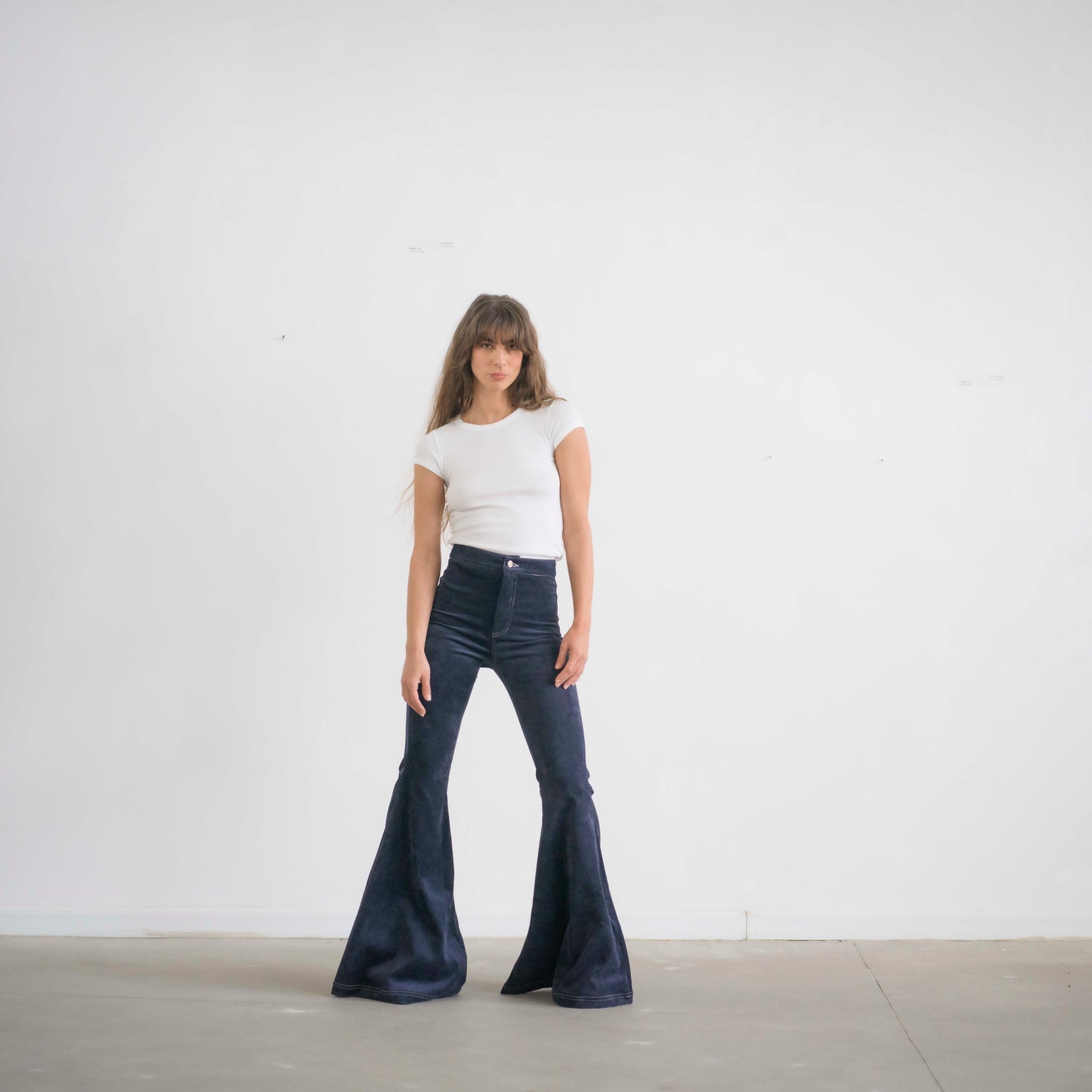 SIMIS The Holly Cord Flares in Navy – stylish navy-blue corduroy flare pants with a tailored high waist and bold, confident look.