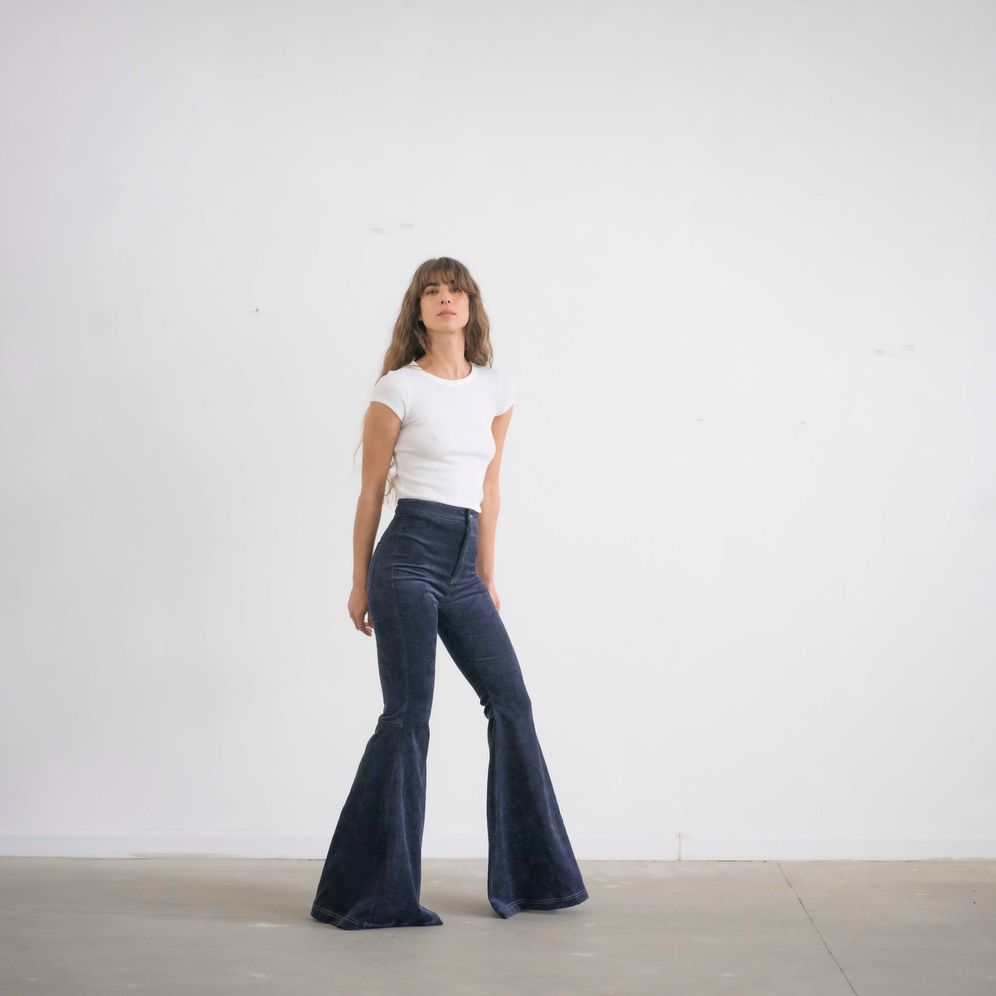 SIMIS The Holly Cord Flares in Navy – stylish navy-blue corduroy flare pants with a tailored high waist and bold, confident look.