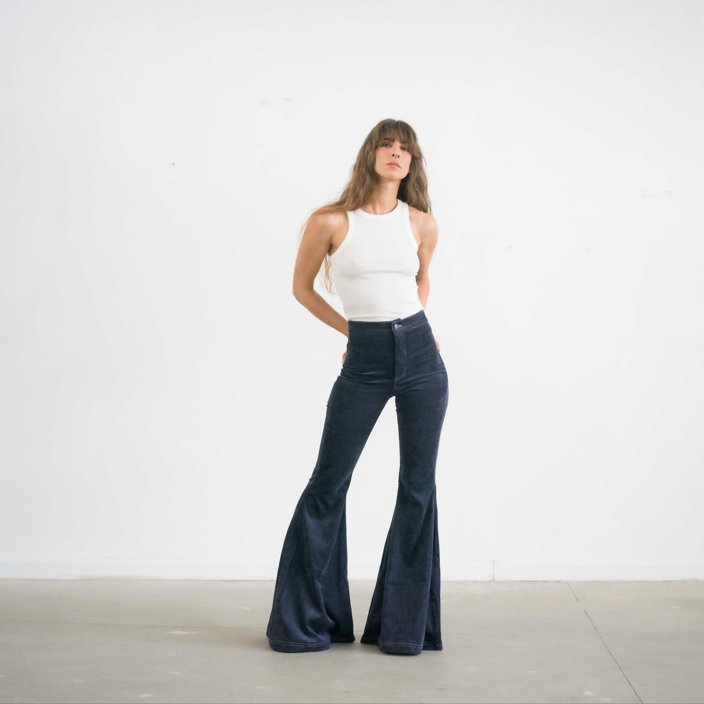 SIMIS The Holly Cord Flares in Navy – stylish navy-blue corduroy flare pants with a tailored high waist and bold, confident look.